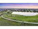 The golf course and scenic lake enhance this community's natural beauty at 14381 Heritage Landing Blvd, Punta Gorda, FL 33955