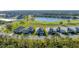 Scenic community with golf course and waterfront views surrounded by trees at 14381 Heritage Landing Blvd, Punta Gorda, FL 33955