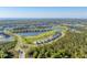 Expansive community with a beautiful golf course, lake, and lush landscaping at 14381 Heritage Landing Blvd, Punta Gorda, FL 33955