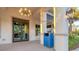 Welcoming building entrance featuring stylish lighting, and a secure double-door entry at 14381 Heritage Landing Blvd, Punta Gorda, FL 33955