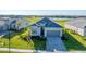 Charming single-Gathering home with a spacious driveway and well-manicured lawn at 14381 Heritage Landing Blvd, Punta Gorda, FL 33955