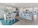 Bright kitchen featuring white cabinets, stainless steel appliances, and island seating, great for gatherings at 16290 Maya Cir, Punta Gorda, FL 33955