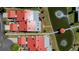 Bird's-eye view of a home highlighting its location near a pond and neighboring houses at 1780 Deborah Dr # 25, Punta Gorda, FL 33950