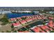 Aerial view of the property complex, complete with a pond, gazebo, and surrounding community at 1780 Deborah Dr # 25, Punta Gorda, FL 33950