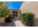 Inviting screened entrance with a beautiful arched doorway and lush landscaping, offering a private welcome at 1780 Deborah Dr # 25, Punta Gorda, FL 33950