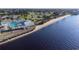 Aerial view of beach side park featuring ocean views, a swimming pool, and waterfront access at 21194 Edgewater Dr, Port Charlotte, FL 33952