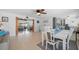 Elegant dining room featuring natural light, stylish furniture, and open layout at 21194 Edgewater Dr, Port Charlotte, FL 33952