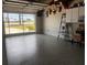 Bright, clean garage with an epoxy floor, offering a versatile space at 21194 Edgewater Dr, Port Charlotte, FL 33952