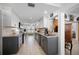 Modern kitchen with updated appliances, granite countertops, and two-tone cabinets at 21194 Edgewater Dr, Port Charlotte, FL 33952