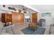 Spacious living room with barn doors and comfortable seating, perfect for relaxation at 21194 Edgewater Dr, Port Charlotte, FL 33952