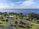 Park view featuring playground, basketball court, tennis court, and waterfront scenery at 21194 Edgewater Dr, Port Charlotte, FL 33952