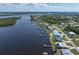 Aerial view of the waterfront property with private dock at 2308 Harbour Dr, Punta Gorda, FL 33983