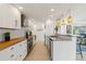 Stylish kitchen with stainless appliances, butcher block counters, and pendant lighting at 2308 Harbour Dr, Punta Gorda, FL 33983
