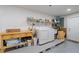 Bright laundry room with a work bench and built-in storage solutions at 2308 Harbour Dr, Punta Gorda, FL 33983