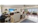 Bright and open living room featuring water views and comfortable seating arrangements at 2308 Harbour Dr, Punta Gorda, FL 33983