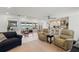 Open-concept living space with water views, flowing into the kitchen and dining areas at 2308 Harbour Dr, Punta Gorda, FL 33983