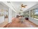 Open living space featuring a sunroom and tile flooring at 2308 Harbour Dr, Punta Gorda, FL 33983