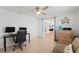 Bright office space with ceiling fan, tile floors, desk, and comfortable seating at 2308 Harbour Dr, Punta Gorda, FL 33983