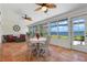 Relaxing sun room with tile floors, comfortable seating, a dining table and gorgeous water views at 2308 Harbour Dr, Punta Gorda, FL 33983