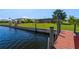 Water view from the dock to the home at 2308 Harbour Dr, Punta Gorda, FL 33983