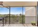 Enjoy the scenic views from this screened balcony with an installed ceiling fan at 25188 Marion Ave # E409, Punta Gorda, FL 33950