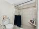 Shower with built-in tile bench and clear glass door at 25188 Marion Ave # E409, Punta Gorda, FL 33950
