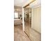 Spacious main bedroom with mirrored closet doors and views of the water from the window at 25188 Marion Ave # F106, Punta Gorda, FL 33950