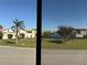 Beautiful view from the home, showcasing lush greenery at 25188 Marion Ave # F106, Punta Gorda, FL 33950