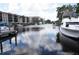 Waterfront condos with boat dock offering scenic views and convenient boating access for residents at 25188 Marion Ave # F106, Punta Gorda, FL 33950