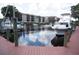 Waterfront condos with dock, featuring boat slips, perfect for boating enthusiasts and scenic views at 25188 Marion Ave # F106, Punta Gorda, FL 33950
