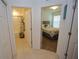 Hallway view to the bathroom and spare bedroom at 25325 E Lenox Cir, Punta Gorda, FL 33950