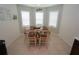 Charming dining area featuring bright natural light and seating for six at the table at 25325 E Lenox Cir, Punta Gorda, FL 33950