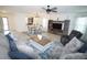 Stylish living room with a comfortable sofa, coffee table, and entertainment center, perfect for relaxation at 25325 E Lenox Cir, Punta Gorda, FL 33950