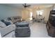 Inviting living room and dining area featuring stylish furnishings and an open layout at 25325 E Lenox Cir, Punta Gorda, FL 33950