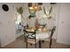 Cozy breakfast nook featuring a round table and chairs, perfect for enjoying morning coffee at 25472 Tevesine Ct, Punta Gorda, FL 33983