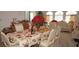 Formal dining area with an elegant table setting and decorative accents at 25472 Tevesine Ct, Punta Gorda, FL 33983