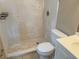 A bathroom featuring a walk-in shower, toilet, and vanity with sink at 30147 Holly Rd, Punta Gorda, FL 33982