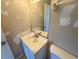 Modest bathroom featuring a vanity and mirror at 30147 Holly Rd, Punta Gorda, FL 33982