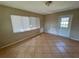 An open room with a window and door, filled with natural light at 30147 Holly Rd, Punta Gorda, FL 33982