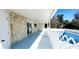 Covered patio overlooking the pool and backyard of this cozy home at 3372 Elkcam Blvd, Port Charlotte, FL 33952