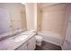 Well-lit bathroom with granite vanity, tub, and shower with chrome fixtures at 359 Paramaribo St, Punta Gorda, FL 33983