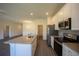 Modern kitchen featuring stainless steel appliances and a large island at 359 Paramaribo St, Punta Gorda, FL 33983