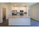 Open concept kitchen features granite counters, stainless appliances, and modern finishes at 359 Paramaribo St, Punta Gorda, FL 33983