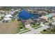 Beautiful waterfront homes featuring canals and boat docks in a desirable residential neighborhood at 3606 Whippoorwill Blvd, Punta Gorda, FL 33950