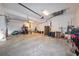 Spacious and organized garage with ample storage space and a clean concrete floor at 3606 Whippoorwill Blvd, Punta Gorda, FL 33950