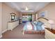 Main bedroom with tray ceilings and sliding glass doors at 3606 Whippoorwill Blvd, Punta Gorda, FL 33950