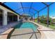 A screened-in pool provides a serene oasis, offering privacy and protection for year-round enjoyment at 3606 Whippoorwill Blvd, Punta Gorda, FL 33950