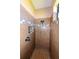 Tiled shower featuring a rainfall shower head at 3606 Whippoorwill Blvd, Punta Gorda, FL 33950