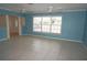 Bright and airy living room with tile floors, neutral walls, and natural light at 594 W Tarpon Nw Blvd, Port Charlotte, FL 33952