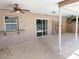 Large covered patio featuring ceiling fans and access to the pool at 594 W Tarpon Nw Blvd, Port Charlotte, FL 33952
